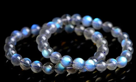 Natural cream body blue moonlight crystal bracelet with grinding treatment showing multiple size options