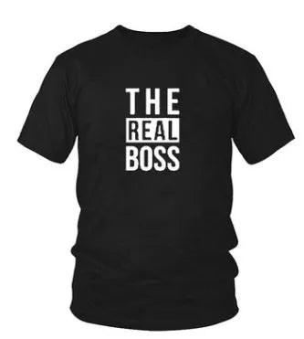 Man's loose fit round neck t-shirt with a graphic print, short sleeves, on a white background.