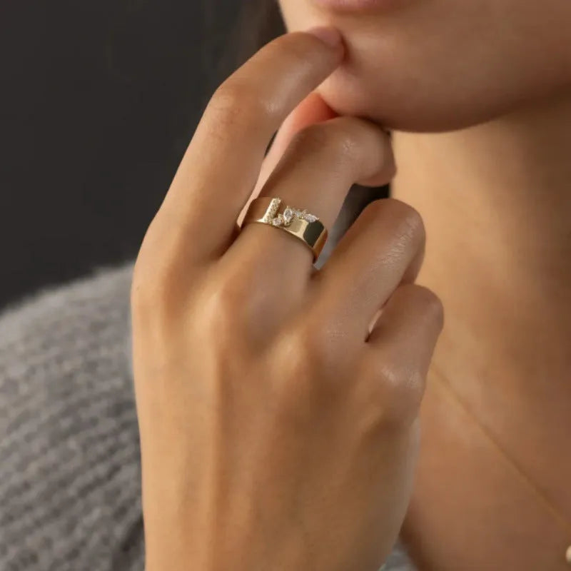 Gold electroplated zircon ring for women showing shining centre stone and metallic finish