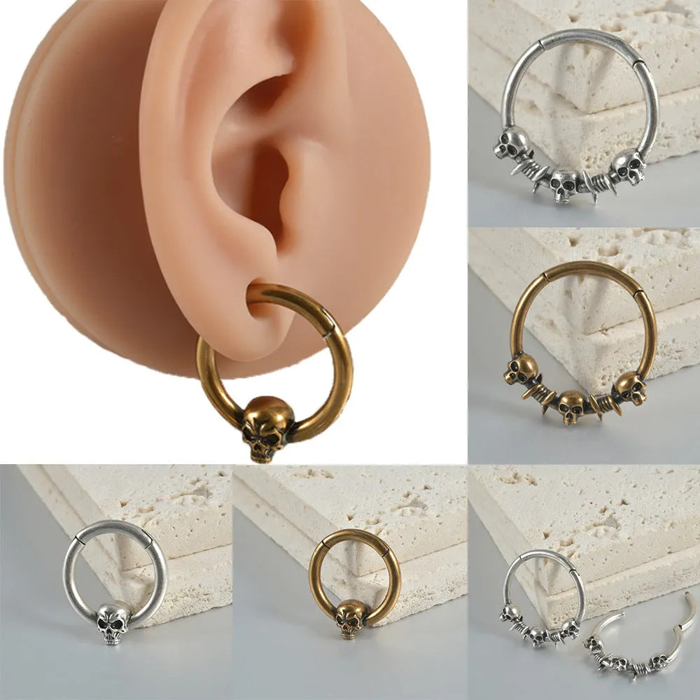 Copper punk earrings with ghost head motifs in antique gold or silver finish