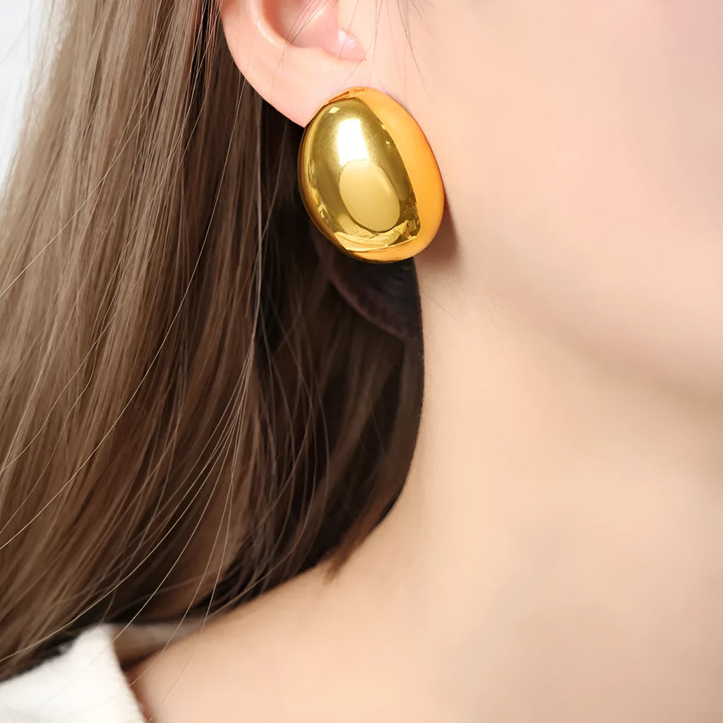 Geometric stainless steel ear studs with line pattern and electroplated glazed finish in colour DFE139