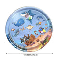 Square blue ocean-themed PVC water play mat for cats with floating fish toys inside, shown on a floor.