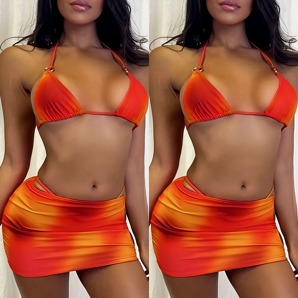 Tie-dye gradient three-piece halter bikini set with skirt on a mannequin