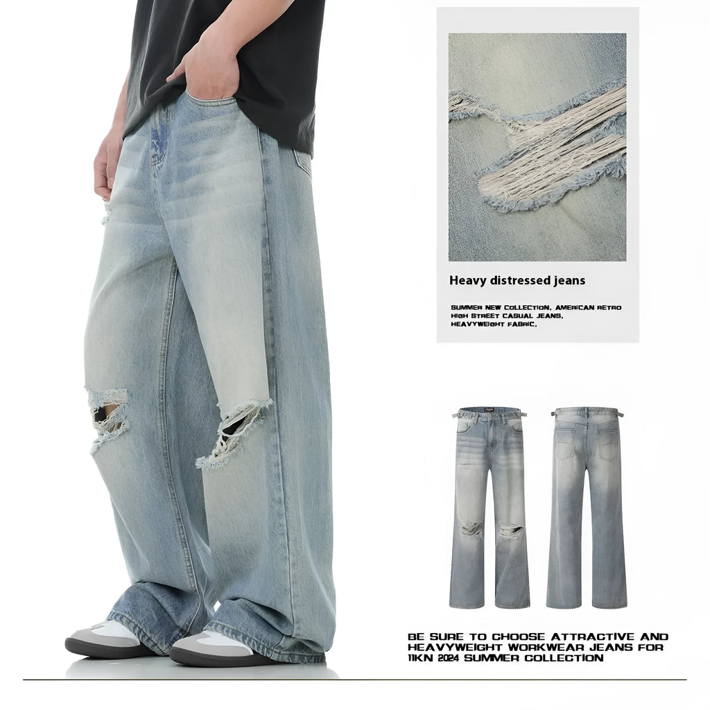 Blue men's straight-leg jeans with ripped distressing detail on the legs.