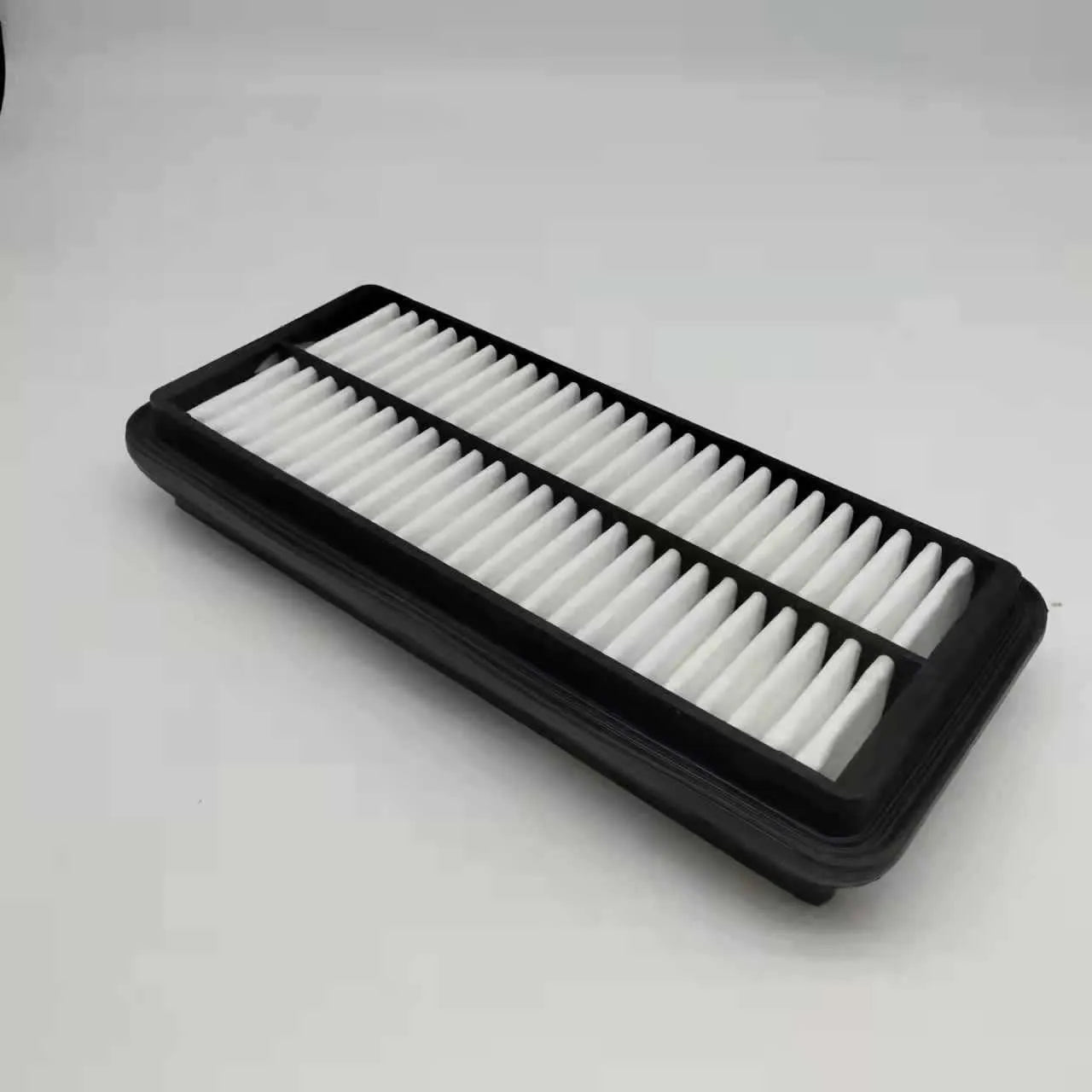 Black rectangular car engine air filter with dimensions 256mm by 113mm by 40mm.