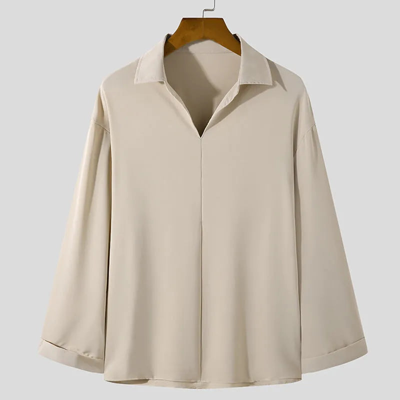 Men's loose lapel casual long sleeve shirt in solid colour on a hanger
