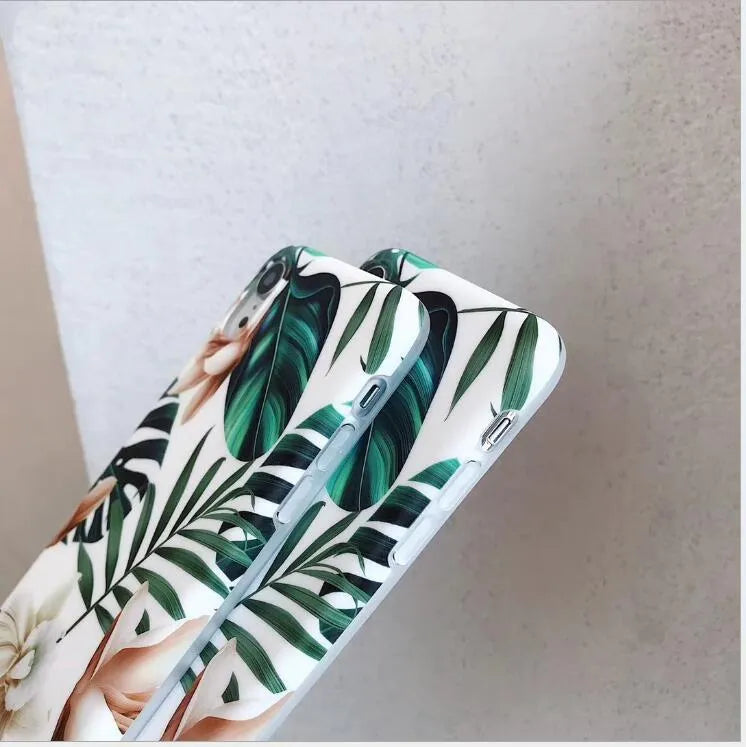 Soft TPU phone case with detailed banana leaf and floral art design for iPhone, shown in flower leaves colour.