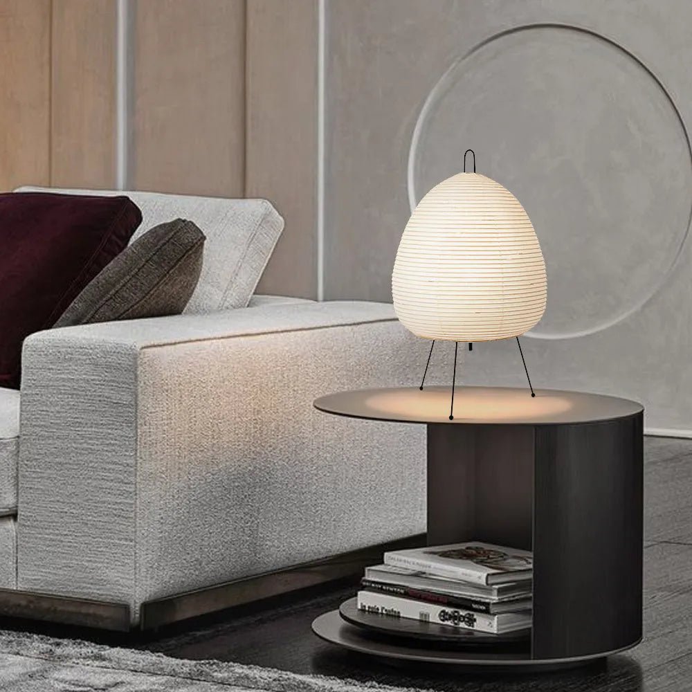 Japanese style rice paper table lamp with handmade shade on aluminium base showing three-tone dimming button