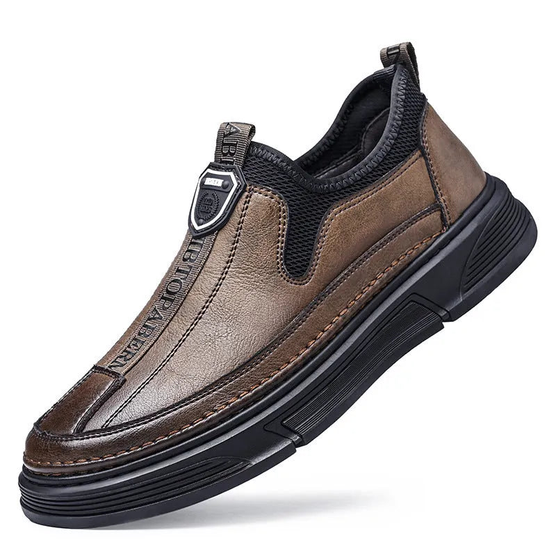 Men's solid colour casual leather shoes with round toe in black and brown options.