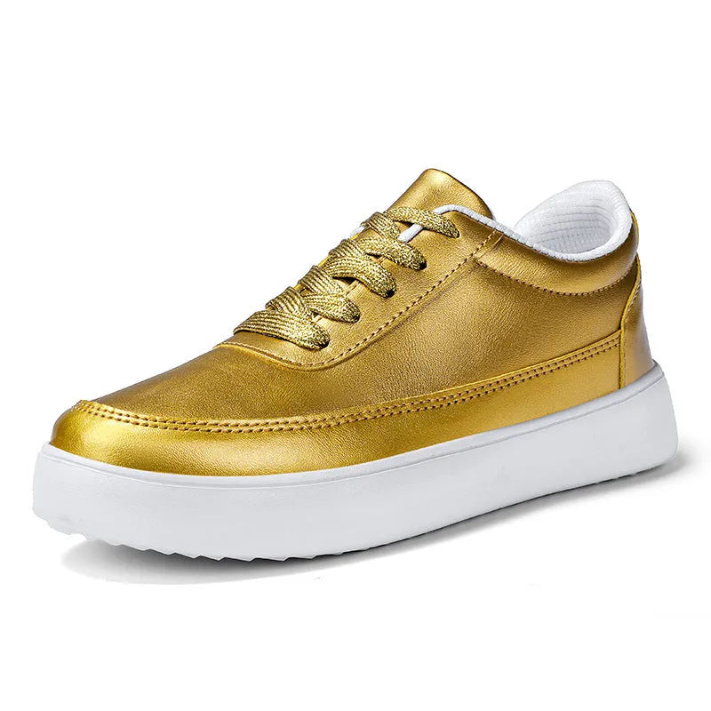 Women's white leather lace-up flat casual shoes on a plain background.