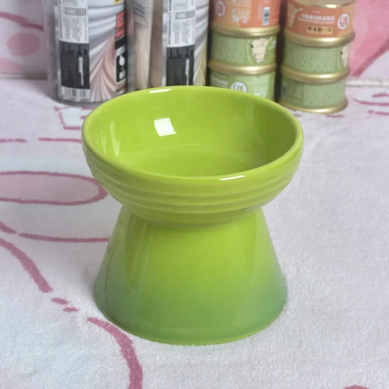 High-foot ceramic pet bowl with chin protector and anti-tumble base design