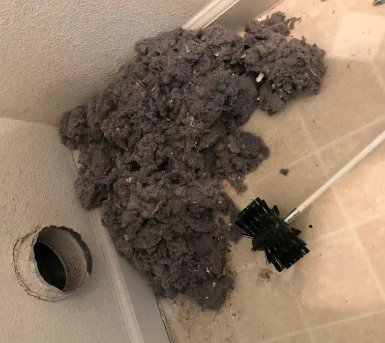 Flexible 600mm long dryer vent and chimney cleaning brush with nylon bristles.