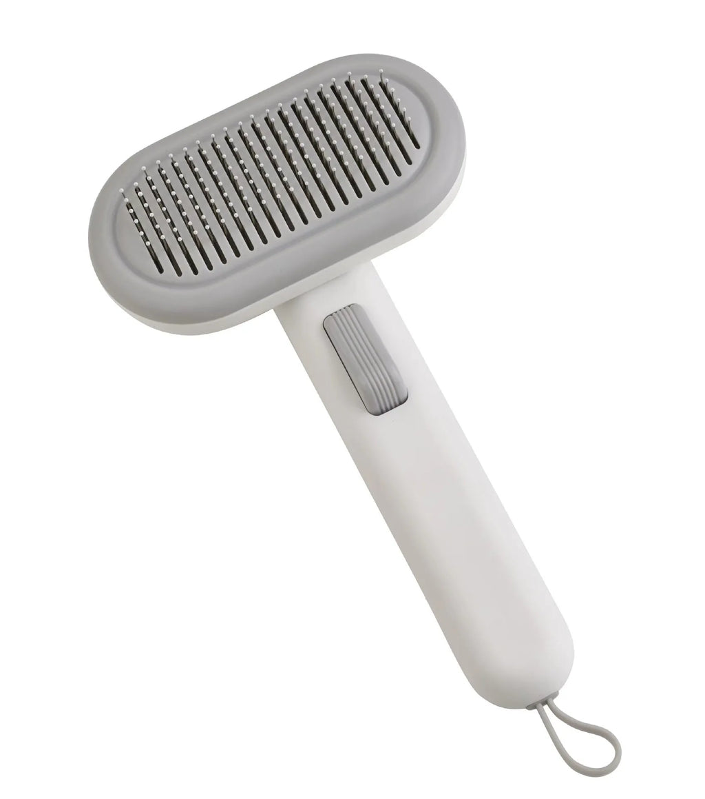 Large pet hair removal comb with floating blades in light green, pink or light grey colour options