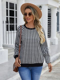 Black long sleeve pullover sweater with a Japanese sweet plaid and stripe pattern on a mannequin.