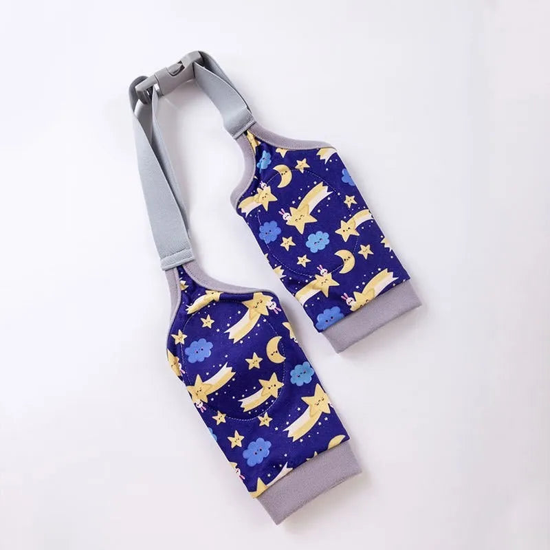 Dog wearing blue knee protector with padded elbow patch and matching scarf