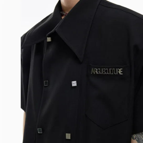 Men's loose fit short-sleeved casual shirt in black with spliced detailing and metal buttons