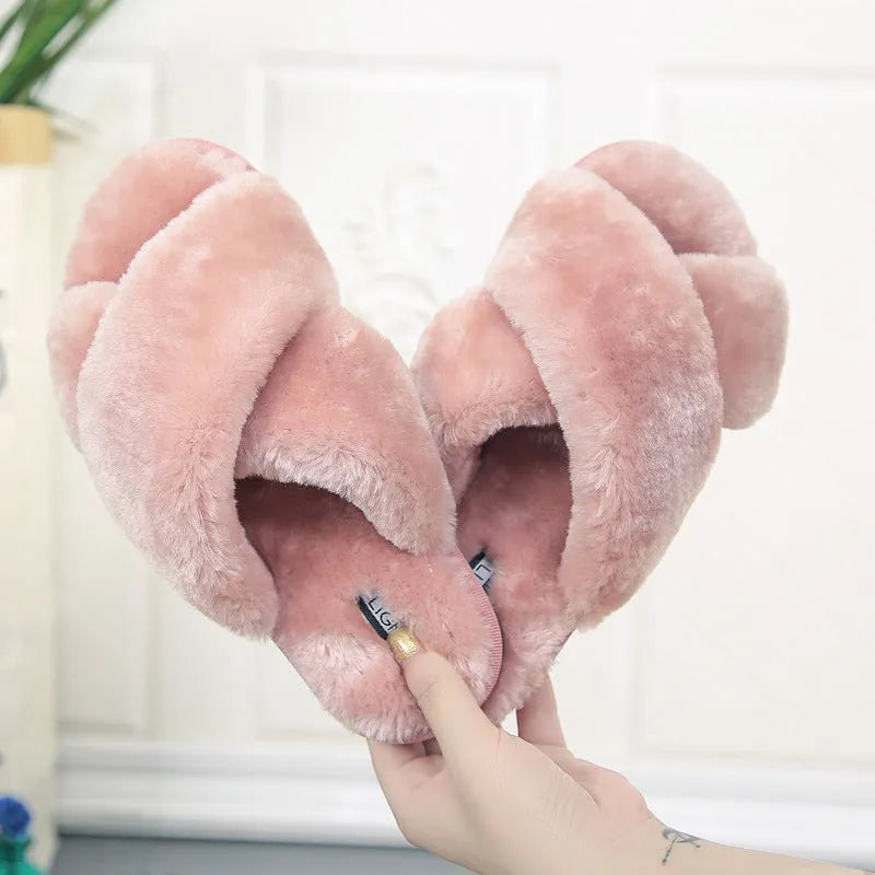 Women's cross open-toe fur slippers in multiple colours on a non-slip patterned sole.