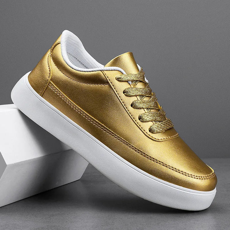 Women's white leather lace-up flat casual shoes on a plain background.