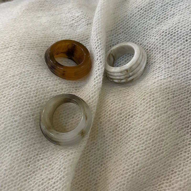 Chinese style irregular geometric resin wide ring in earthy brown and white colour variations