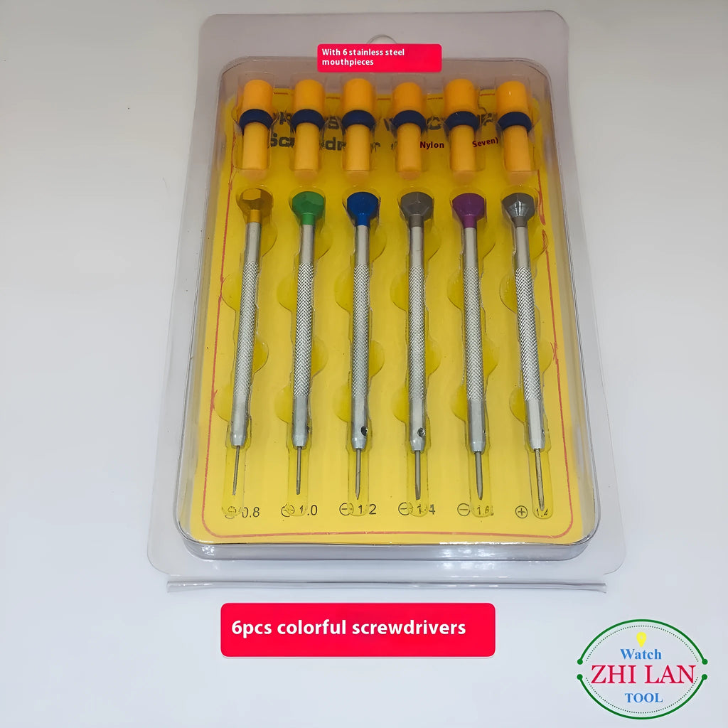 Six colour-coded watch repair screwdrivers with copper handles arranged in aluminium case