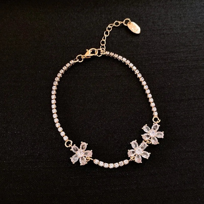 Women's gold-tone copper bracelet with geometric quadrilateral design and inlaid zircon stones