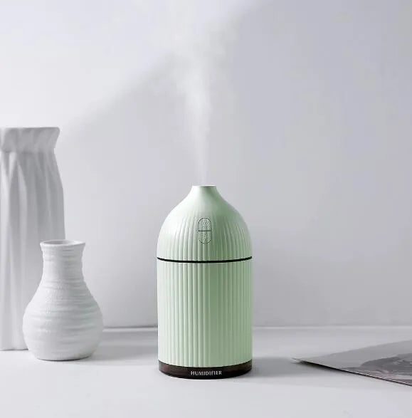 White ultrasonic aromatherapy diffuser with humidifier function and LED light, 80mm diameter