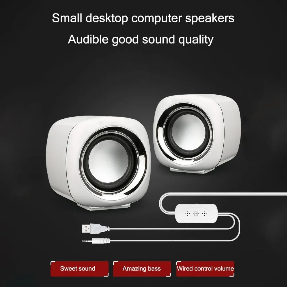 Black or white ABS mini computer speakers measuring 7.2cm with scroll wheel volume control