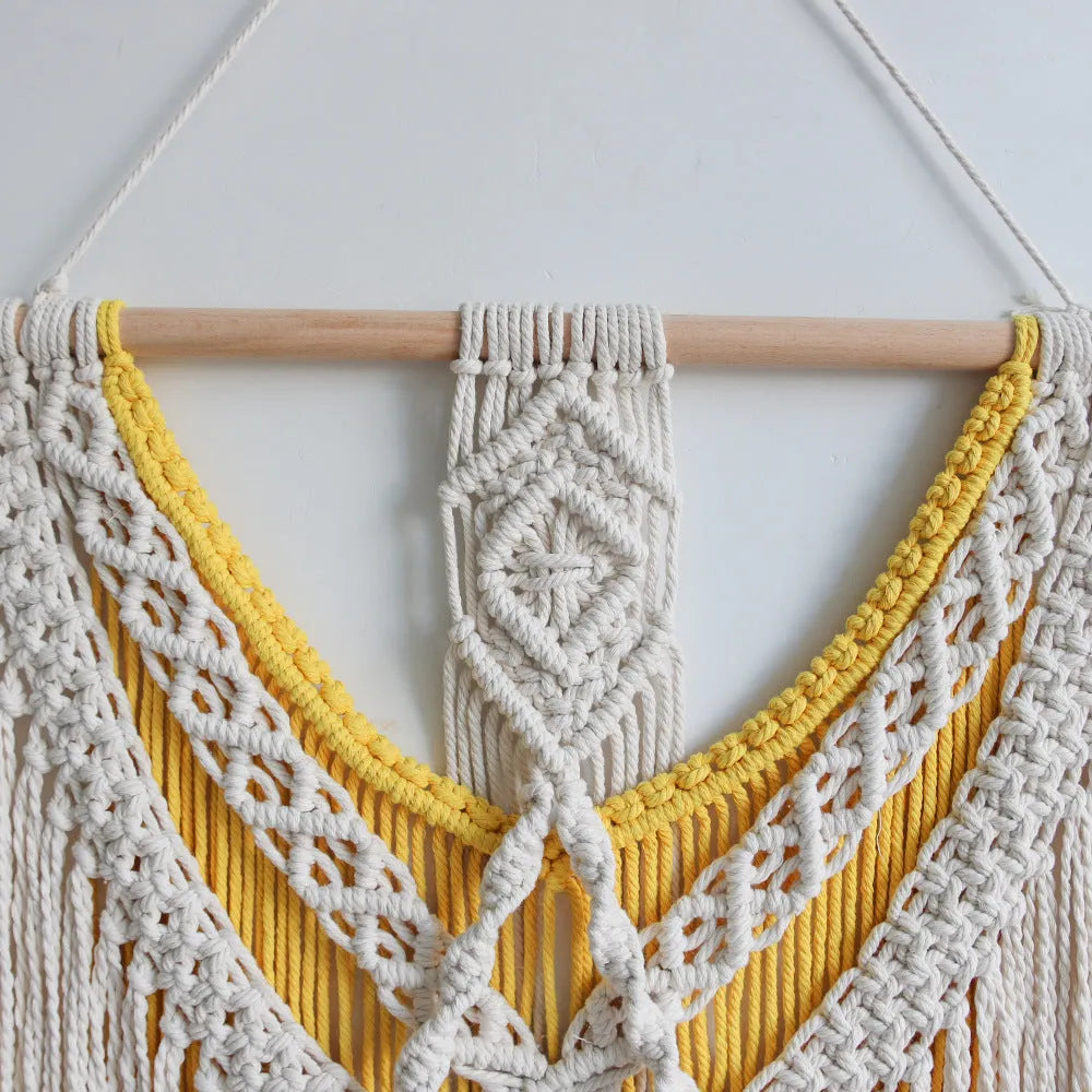 Nordic style woven cotton tapestry in creamy white with yellow accents, rectangular shape measuring 120cm by 95cm