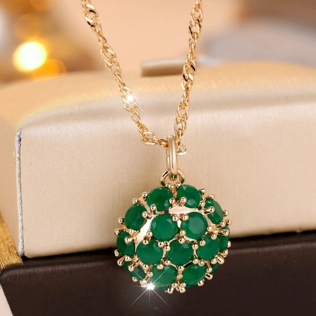 Champagne gold round emerald diamond pendant necklace on an adjustable 51-60cm copper chain.