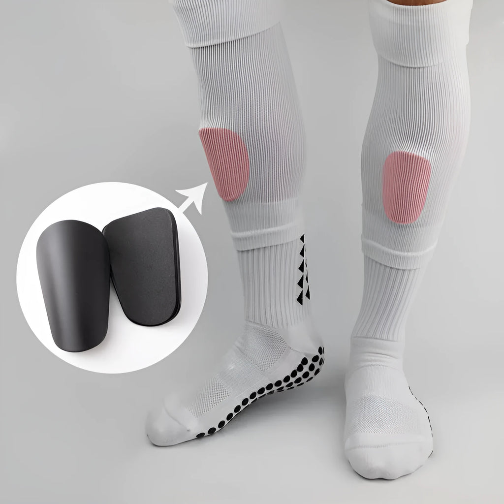 A pair of black PU mini shin guards for football and sports, shown with sizing codes S and XS.
