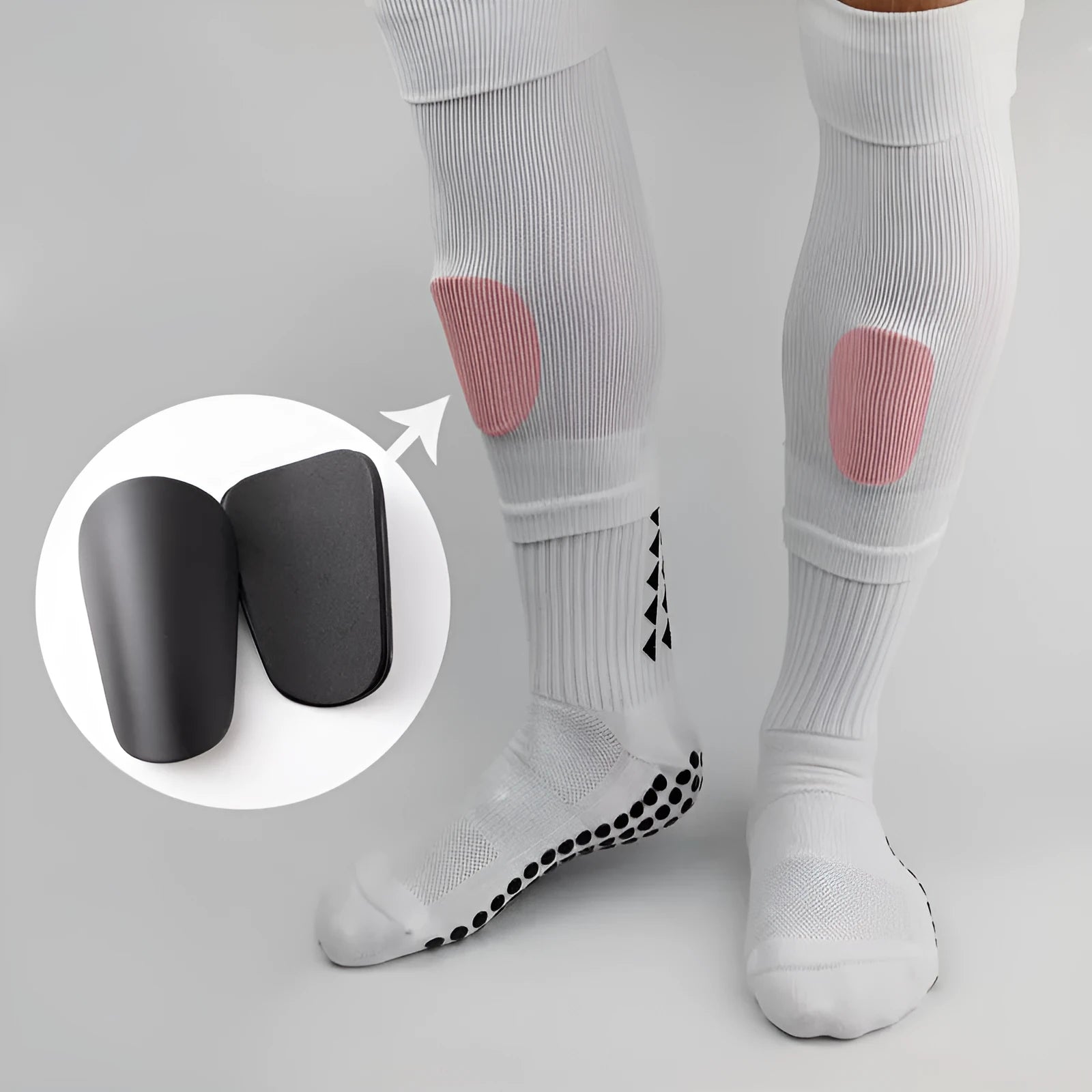 A pair of black PU mini shin guards for football and sports, shown with sizing codes S and XS.