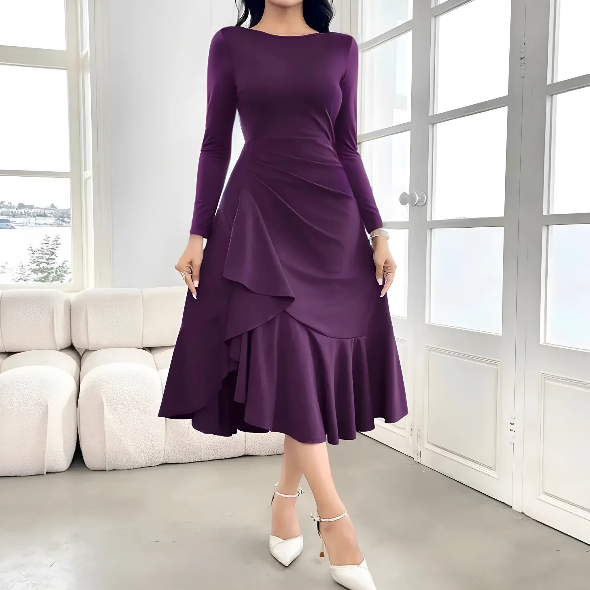 Purple women's long sleeve dress with ruffles and a round neck, shown on a mid-waist silhouette.