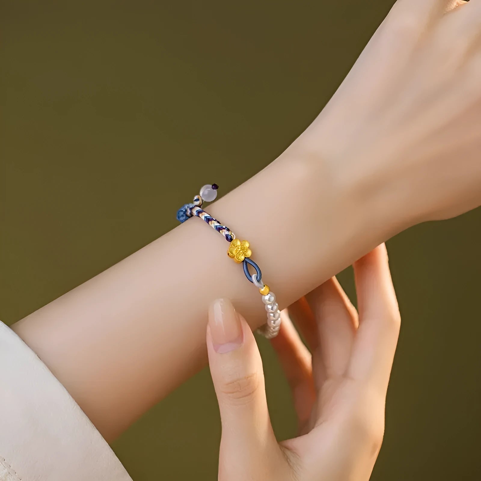 Peach-coloured Chinese flower weaving carrying strap with sterling silver electroplating and pearl details