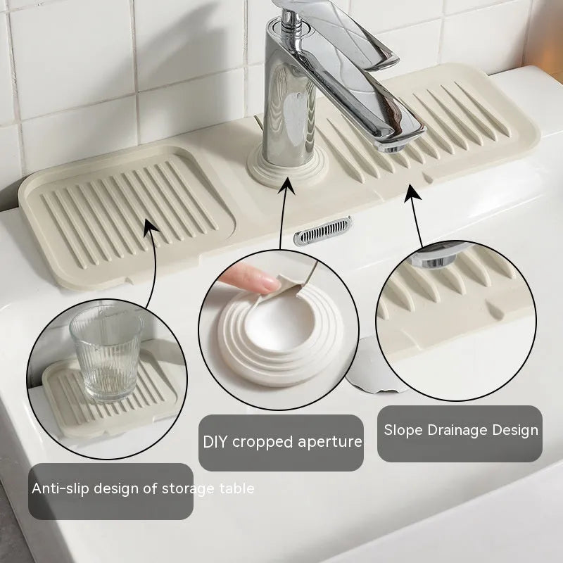 Silicone sink splash guard pad in beige colour showing sloped design with two drain channels.