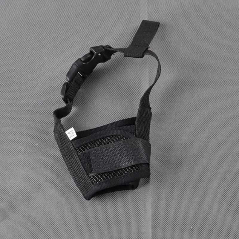 A black adjustable plastic mesh dog muzzle shown on a size chart with options for blue, pink, purple, and red.