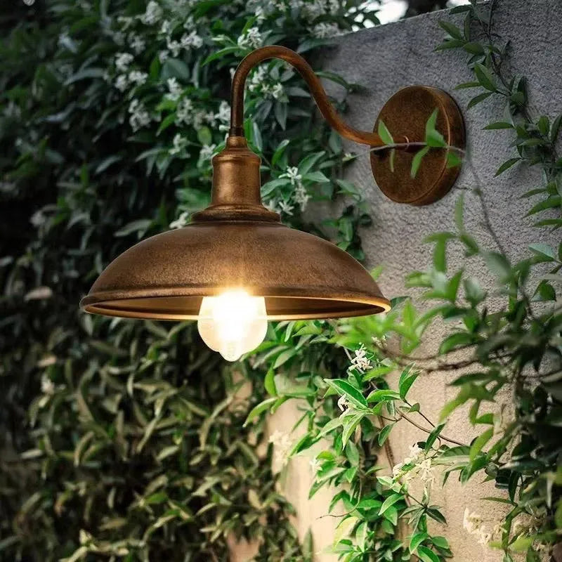 Villa courtyard wall lamp showing adjustable right or oblique angle design in copper or silver finish