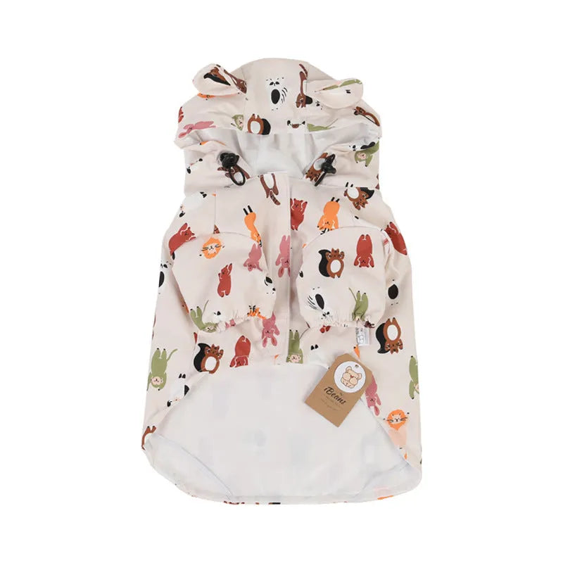 Beige dog raincoat with cartoon cat head pattern, showing waterproof PU material
