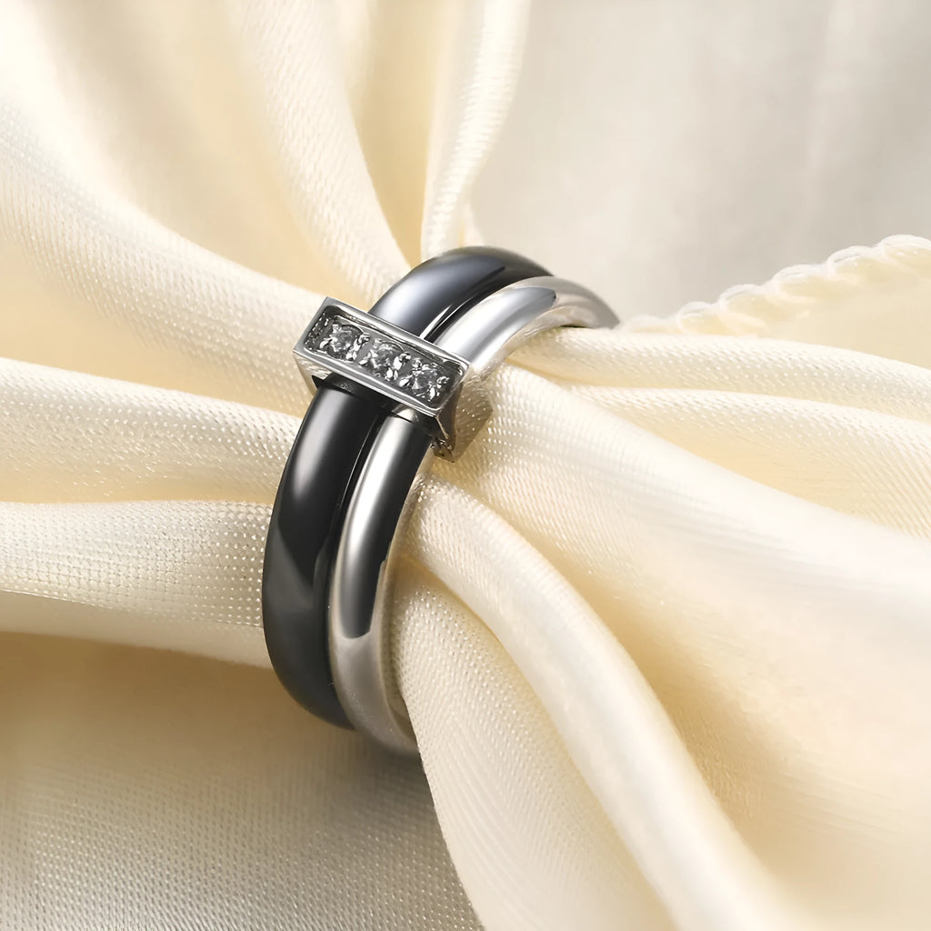 Glossy ceramic women's ring with geometric shape and stitching detail in steel black or gold white finish