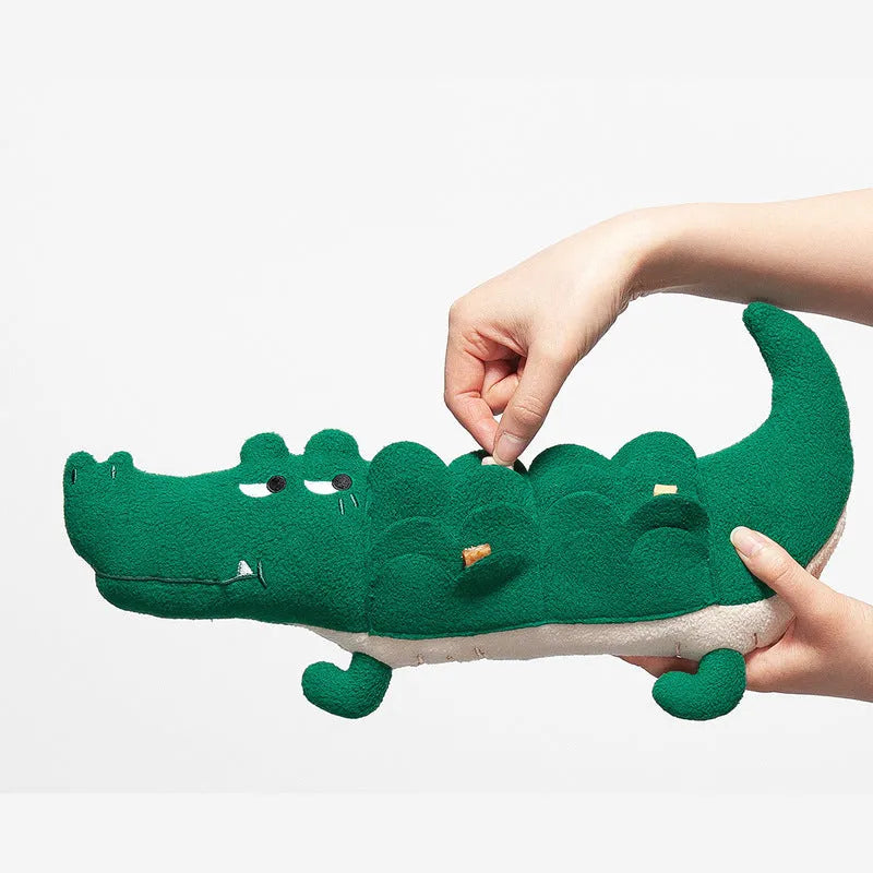 Green plush toy dog stuffed animal on a white background.