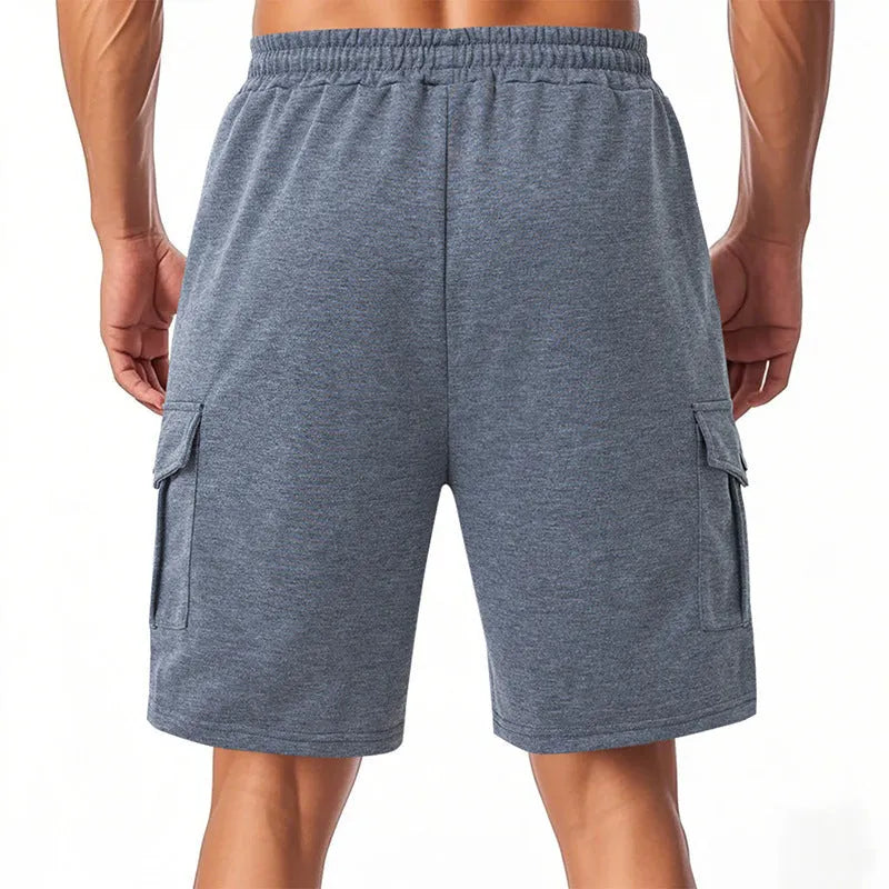 Men's terry cloth cargo shorts with multiple pockets in light grey colour, showing loose fit design