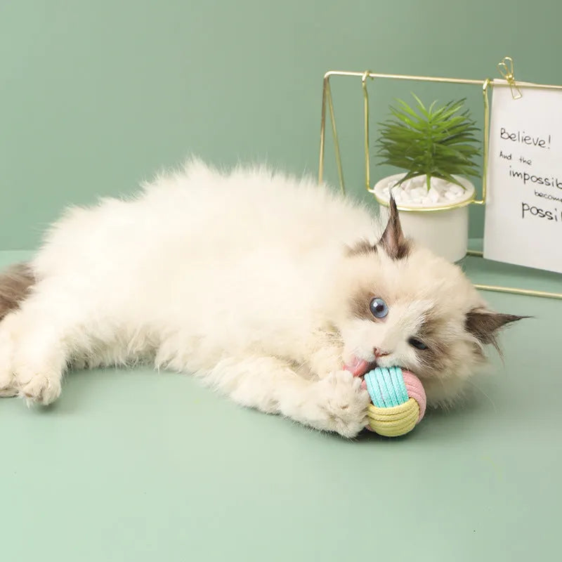 Handmade blue pink cotton cat hair ball plush toy measuring 5cm for interactive pet play