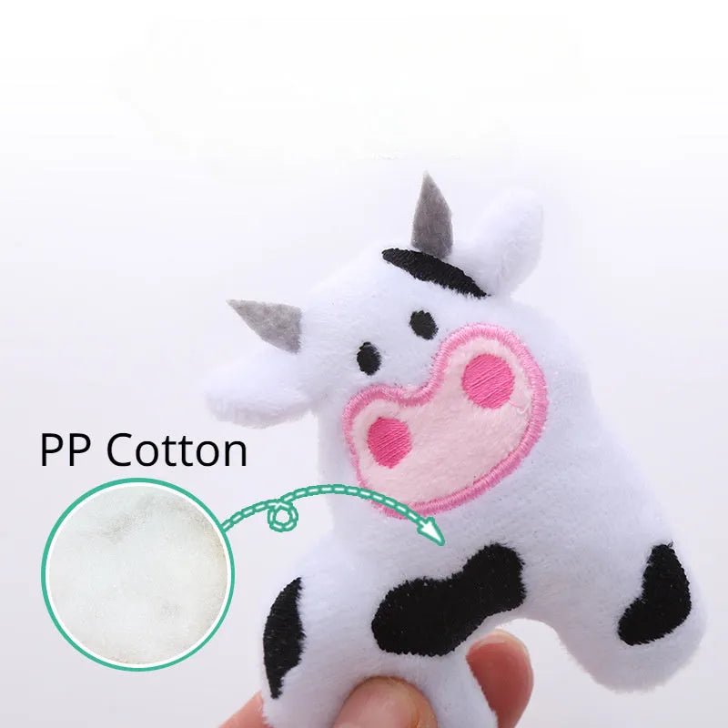 Plush parrot-shaped cat toy with catnip for interactive play next to cow and crocodile options.