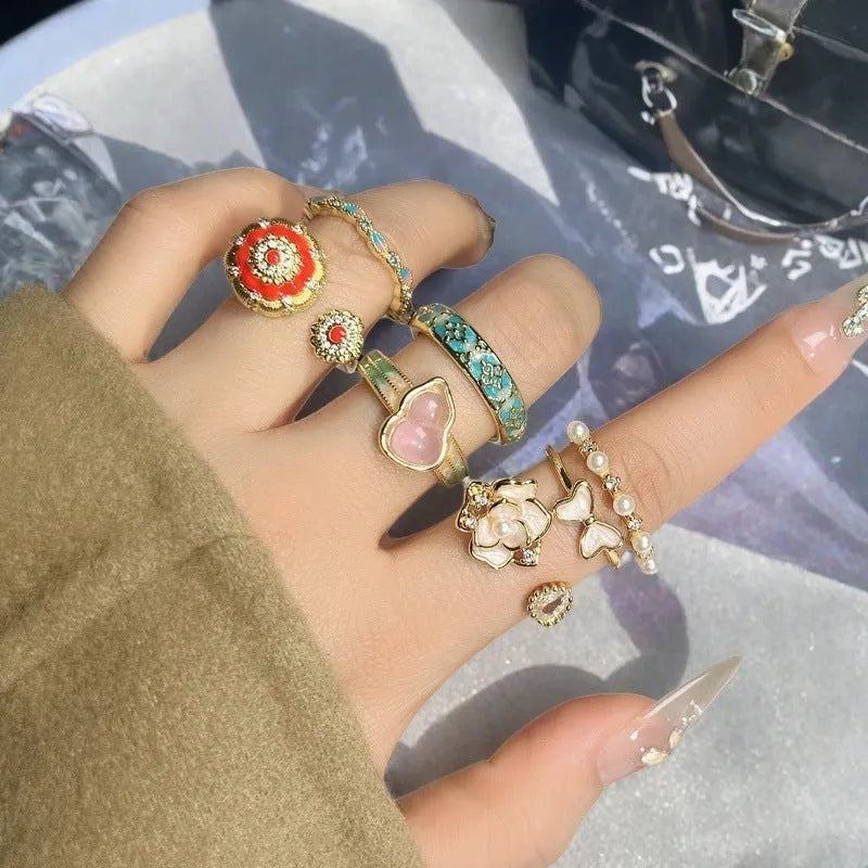 Adjustable copper ring with gourd motif, flower and bow shapes, zircon stones in six colour options