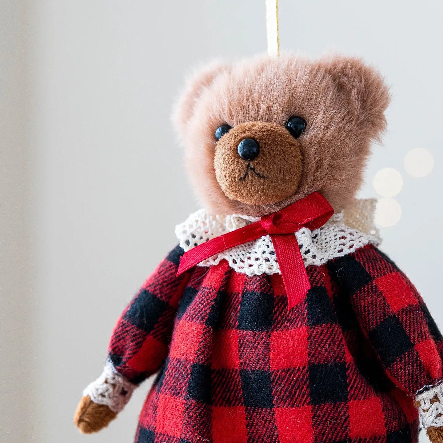 Cartoon plush bear doll couple in cotton plaid suits, showing gentleman bear and princess bear side by side