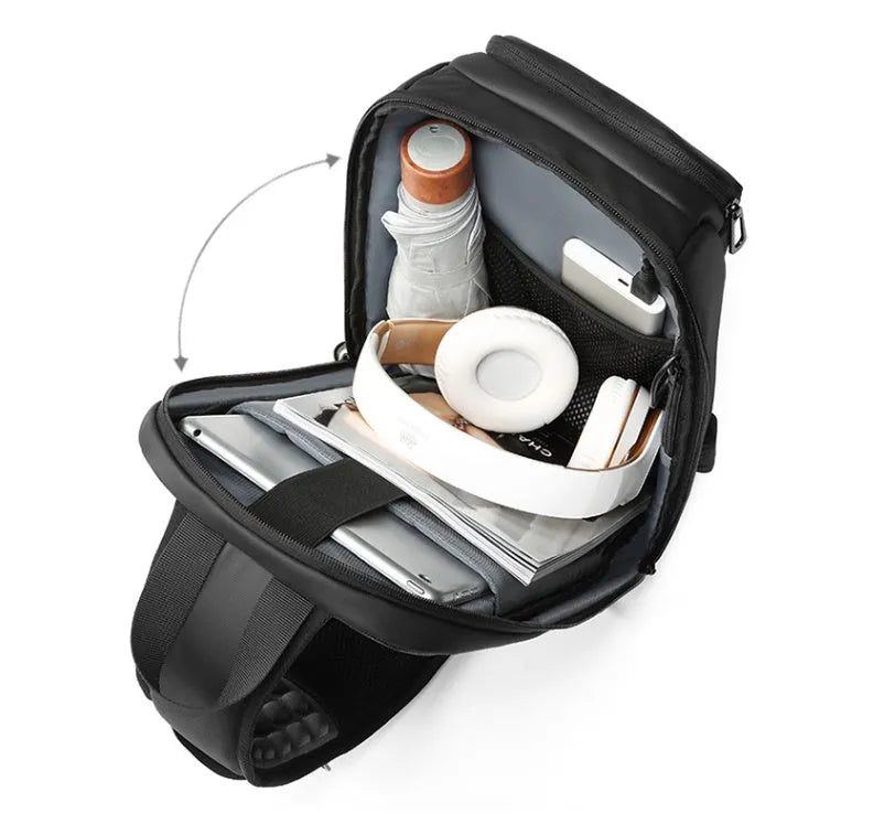 Black PVC outdoor shoulder bag with air cushion strap showing internal laptop and phone compartments