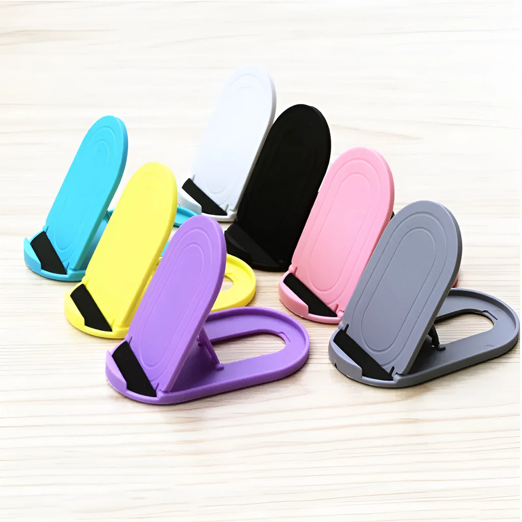 Adjustable plastic mobile phone stand in various colours holding a smartphone