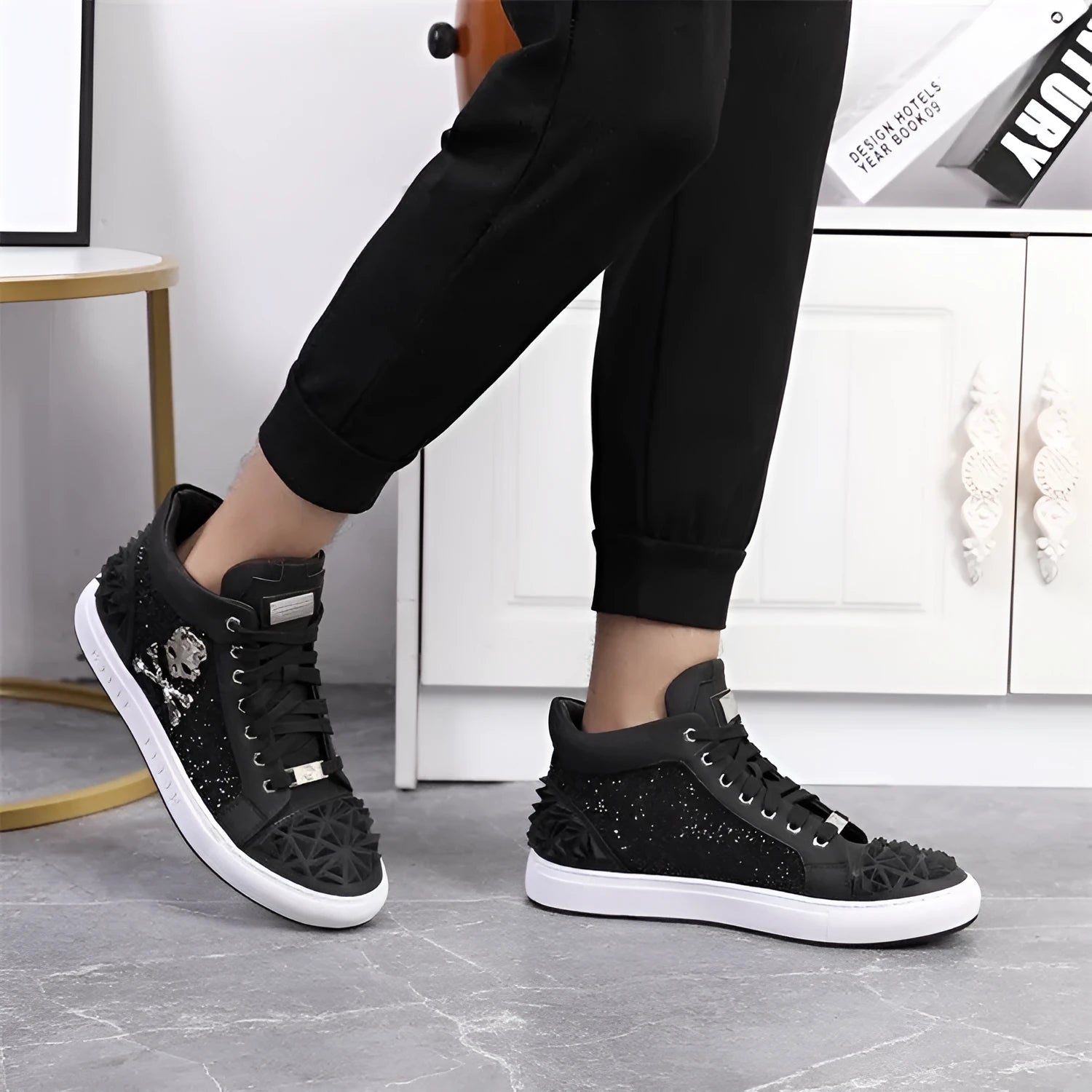 Men's black and red high top skeleton shoes made from genuine leather with a lace-up front.