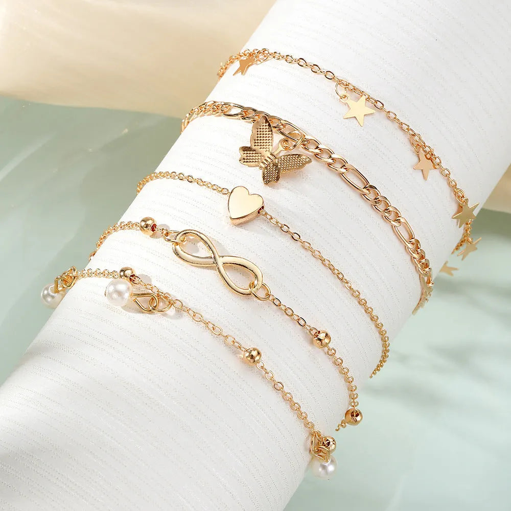 Butterfly pearl heart anklet 4-piece set in alloy with women's simple design