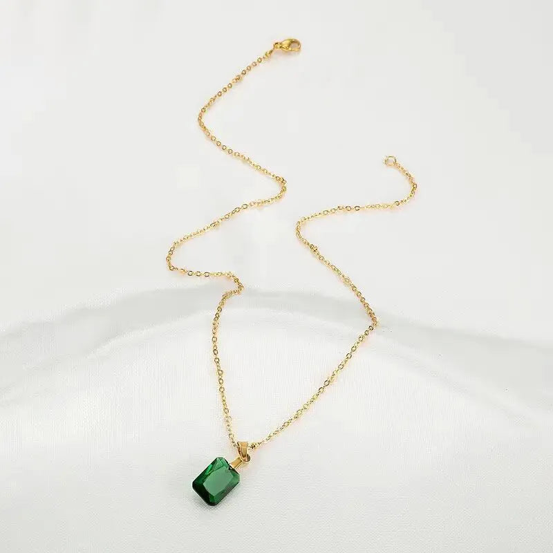 Copper geometric rectangular pendant necklace with quadrilateral details on an O-ring chain