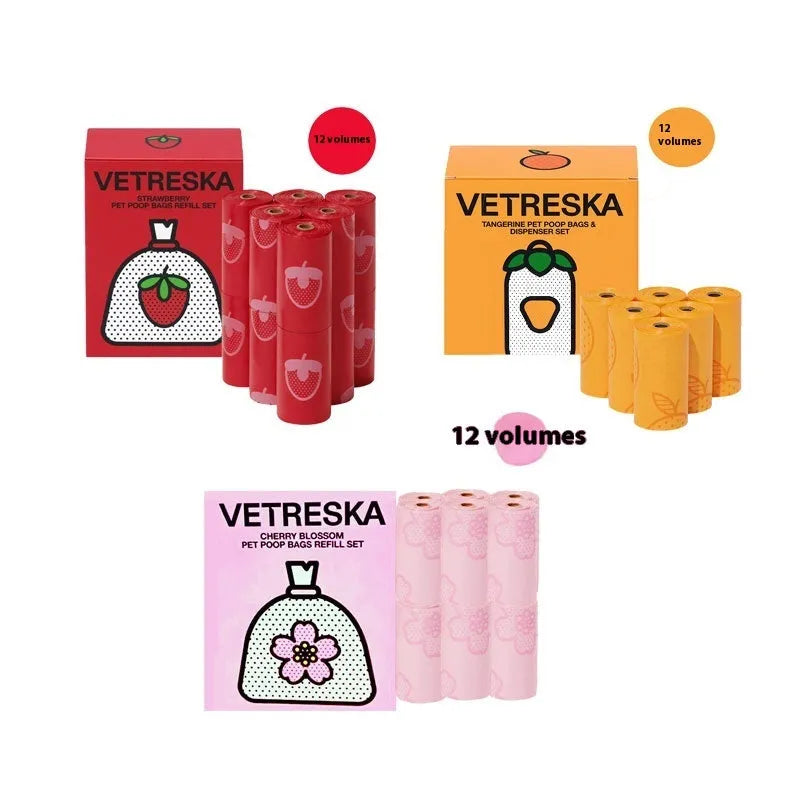 Dog poo bag dispenser capsule with strawberry pattern and roll of 15 biodegradable scented bags